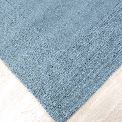 Modrý vlněný koberec 200x290 cm Textured Wool Border Flair Rugs