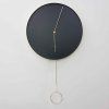 Černé nástěnné kyvadlové hodiny Karlsson Pendulum, o 34 cm