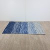 Modrý krátkovlasý koberec 140x200 KAPAKLI